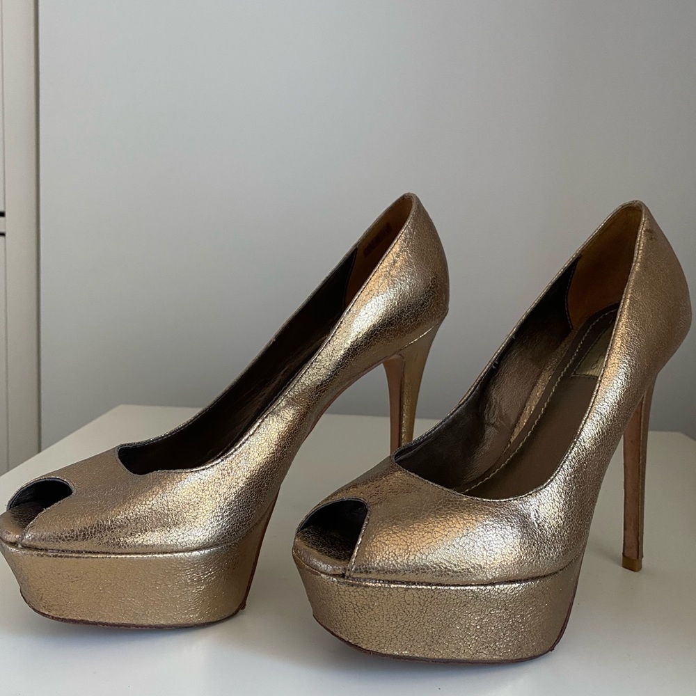 Gold platform heels , size 7.5.